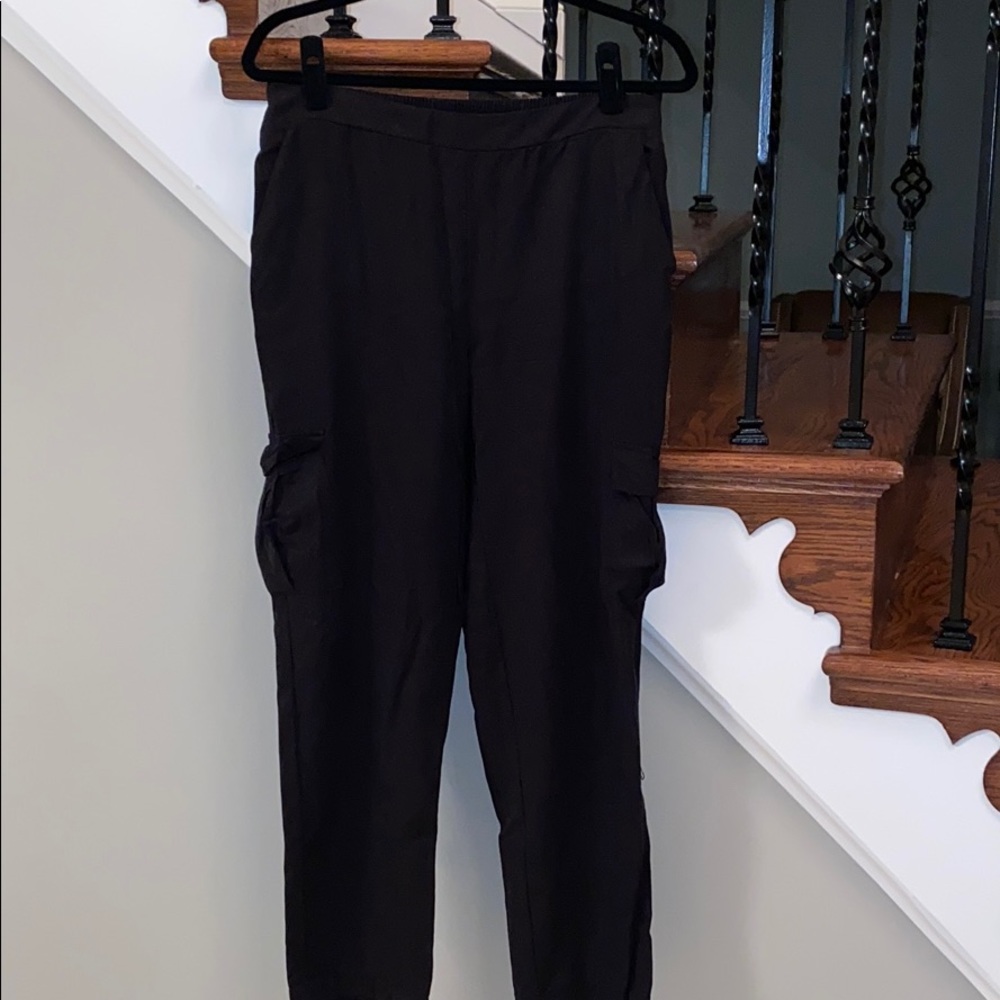 black tapered pants with cargo pockets